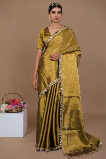 golden handwoven tissue saree with black scalloped lace