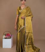 golden handwoven tissue saree with black scalloped lace