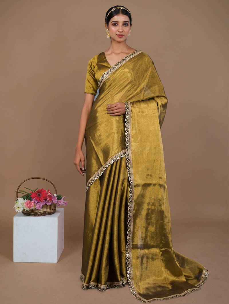 golden handwoven tissue saree with black scalloped lace