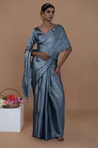 silver handwoven tissue saree with scalloped pallu and border
