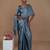 silver handwoven tissue saree with scalloped pallu and border