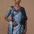 silver handwoven tissue saree with scalloped pallu and border