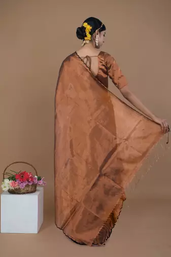 copper handwoven tissue saree with scalloped pallu and border