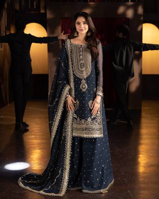 Heavy faux georgette with heavy embroidery sequence work top with sharara dupatta 1