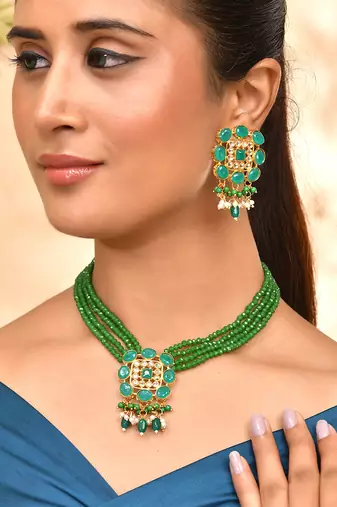 Green necklace & earrings set with kundan