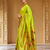 Lime green paithani silk blend saree with zari detailing and blouse