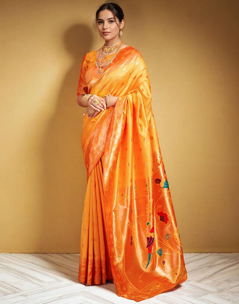 Orange paithani silk blend saree with zari detailing and blouse