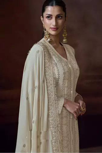 Ivory chinon silk free size upto 44 full stitched suits