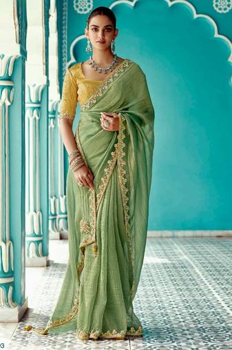 green embroidered saree with jacquard work blouse piece