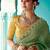 green embroidered saree with jacquard work blouse piece