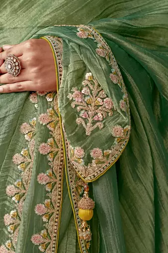 green embroidered saree with jacquard work blouse piece