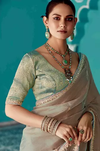 cream embroidered saree with jacquard work blouse piece