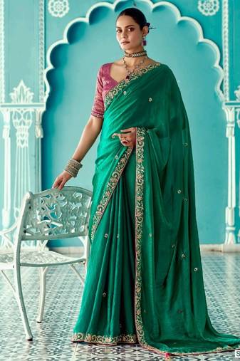 dark green embroidered saree with jacquard work blouse piece