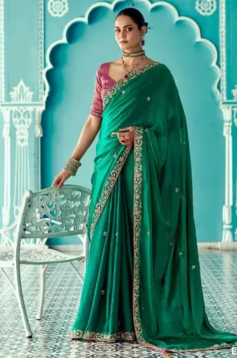 dark green embroidered saree with jacquard work blouse piece