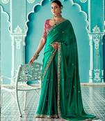 dark green embroidered saree with jacquard work blouse piece