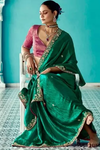 dark green embroidered saree with jacquard work blouse piece