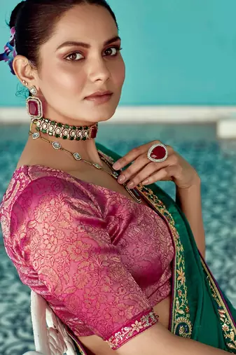 dark green embroidered saree with jacquard work blouse piece