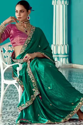 dark green embroidered saree with jacquard work blouse piece