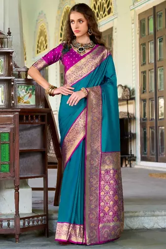 teal banarasi silk blend zari weaving saree with blouse piece