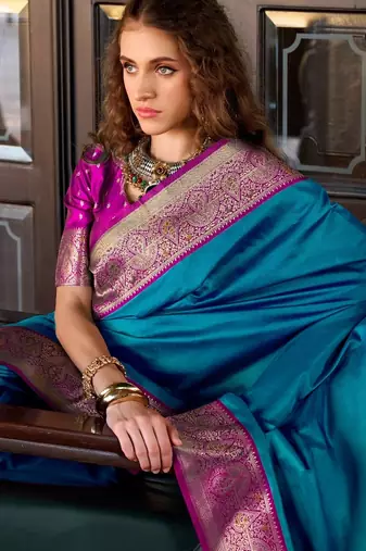 teal banarasi silk blend zari weaving saree with blouse piece