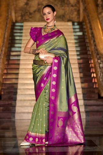 olive banarasi silk blend zari weaving saree with blouse piece