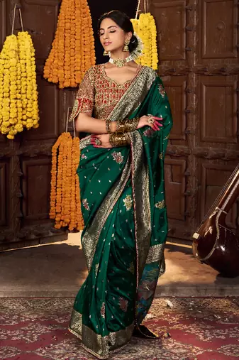dark green silk blend zari weaving saree with embroidered blouse piece