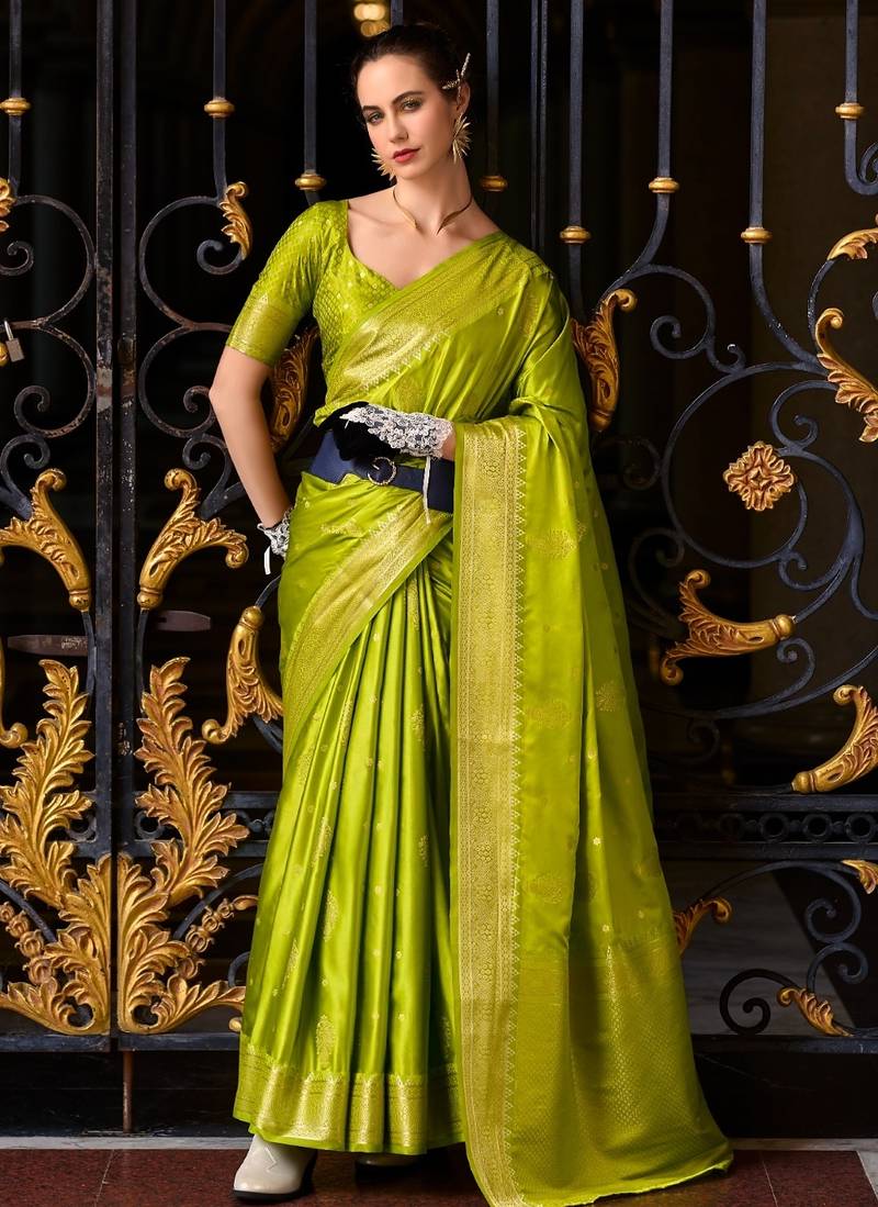 parrot green silk blend tissue zari weaving saree with blouse piece