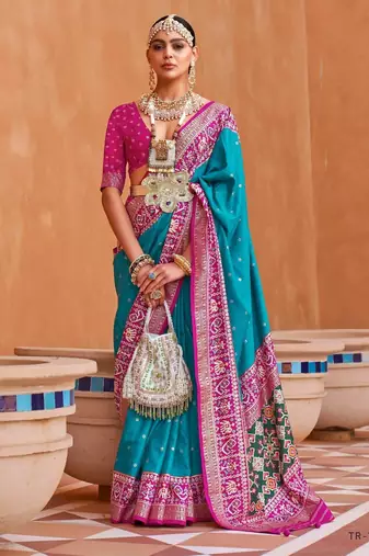 sky blue silk blend zari weaving and patola border saree with blouse piece