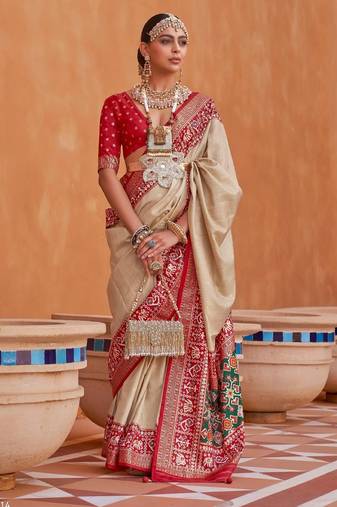beige silk blend zari weaving and patola border saree with blouse piece