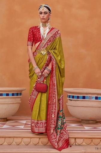 mustard silk blend zari weaving and patola border saree with blouse piece