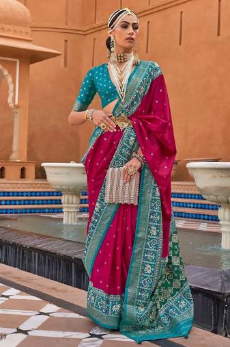 rani pink silk blend zari weaving and patola border saree with blouse piece
