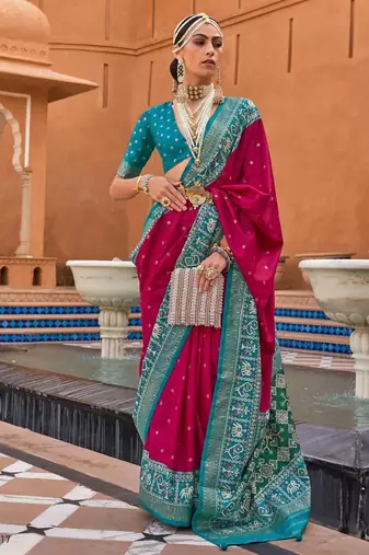 rani pink silk blend zari weaving and patola border saree with blouse piece
