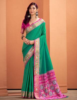 green silk blend zari weaving patola saree with blouse 1