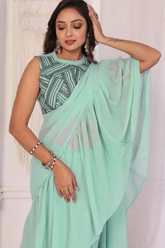 ready to wear sea green georgette ruffle style saree with blouse piece