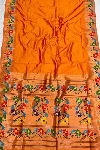 Orange silk blend saree with paithani weaved pallu and blouse