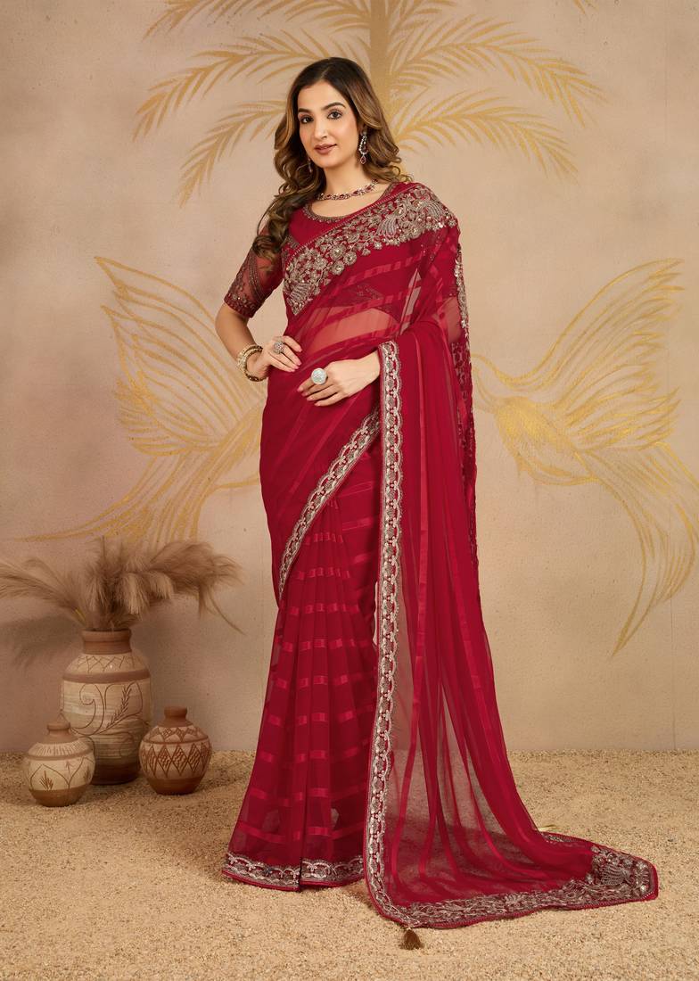 Red chiffon embroidered saree with blouse piece