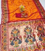 Orange silk blend saree with paithani weaved pallu and blouse