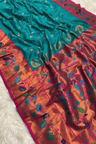 Sky blue banarasi silk blend saree with paithani weaved pallu and blouse