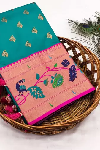 Sky blue banarasi silk blend saree with paithani weaved pallu and blouse