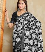black silk blend elephant print saree with jacquard zari border