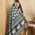 green silk blend elephant print saree with jacquard zari border