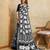 black silk blend elephant print saree with jacquard zari border