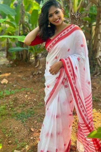 white intricate jacquard weaving saree