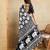 black silk blend elephant print saree with jacquard zari border