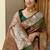 green banarasi silk blend intricate self weave saree