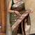 green banarasi silk blend intricate self weave saree