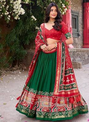 Green and Red Patola-Inspired Lehenga Choli. 1