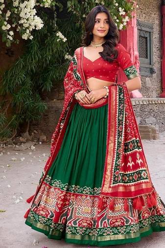 Traditional Green and Red Patola-Inspired Tussar Silk Lehenga Choli.