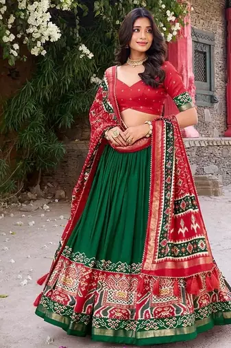 Traditional Green and Red Patola-Inspired Tussar Silk Lehenga Choli.