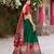 Traditional Green and Red Patola-Inspired Tussar Silk Lehenga Choli.